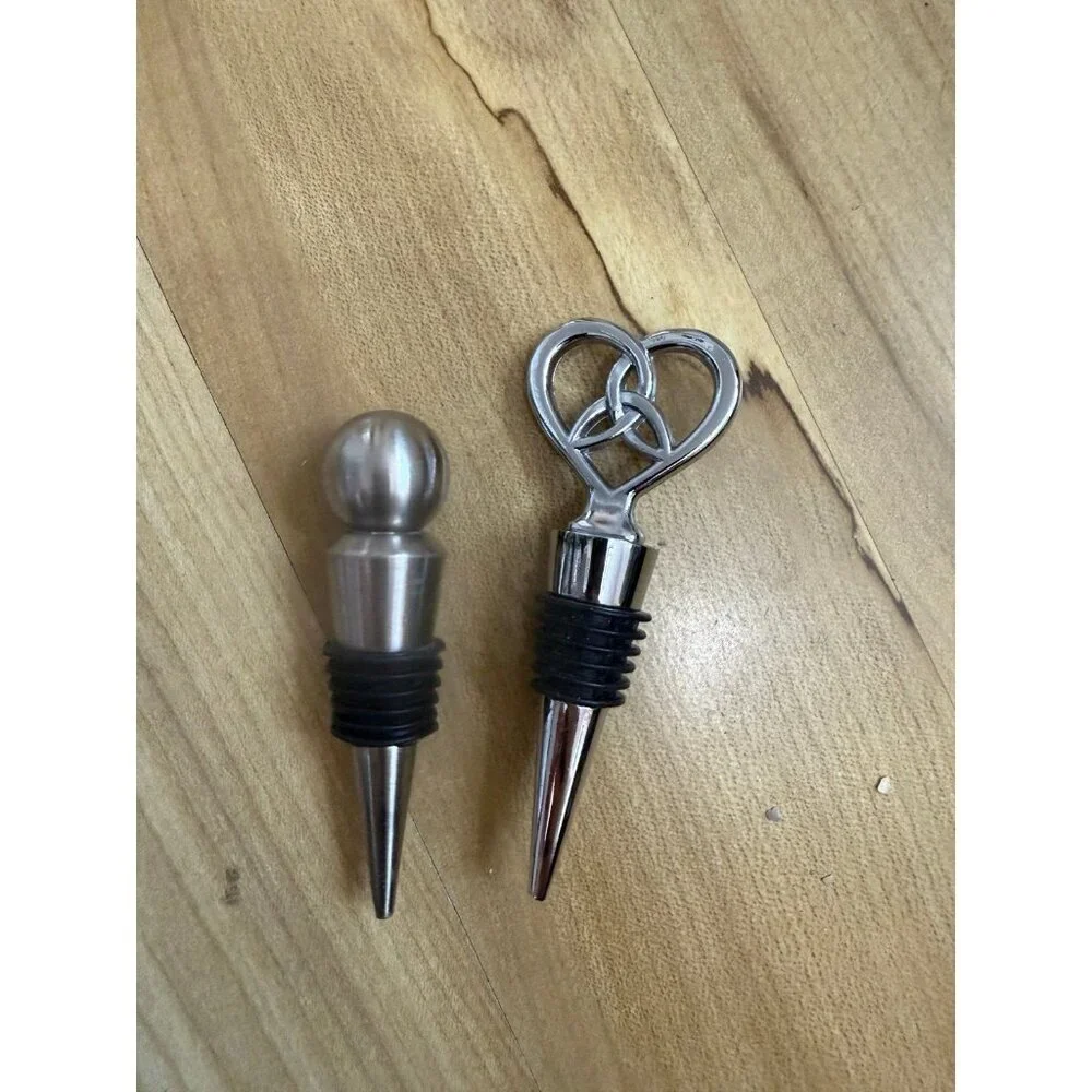 Two piece metal wine stoppers